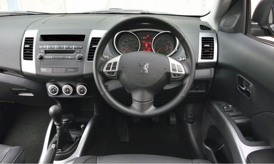  Peugeot 4007 2008 года  (фото 38 из 57)